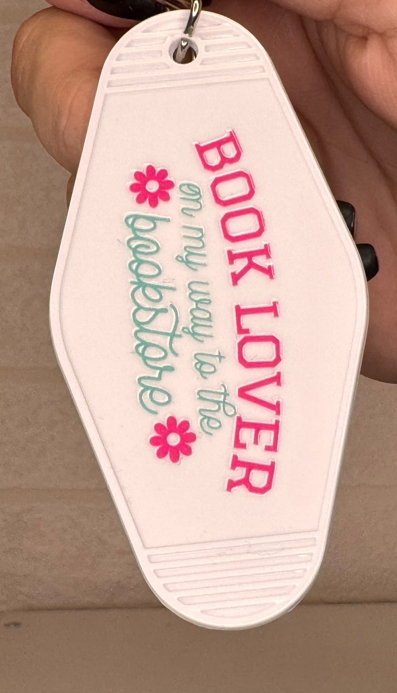 book themed motel keyring