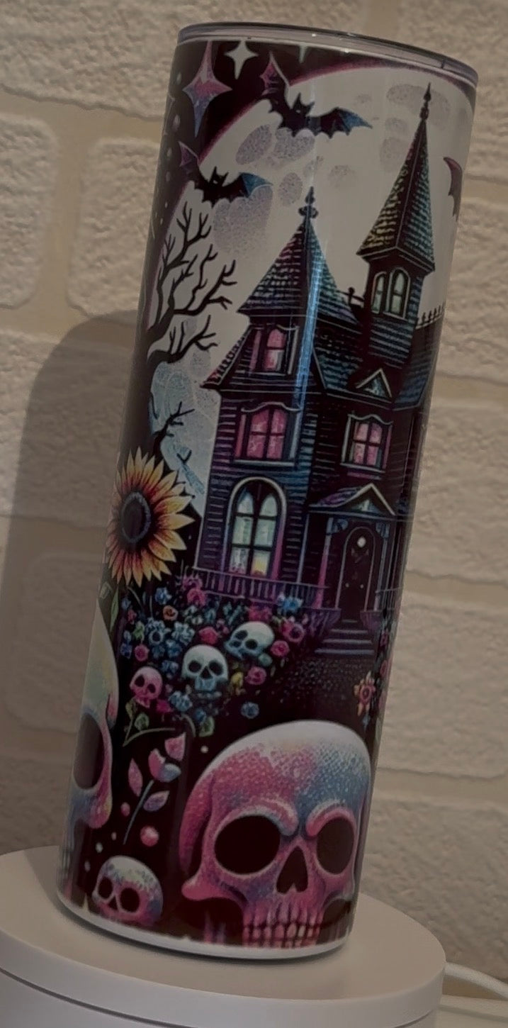 Haunted house tumbler with straw