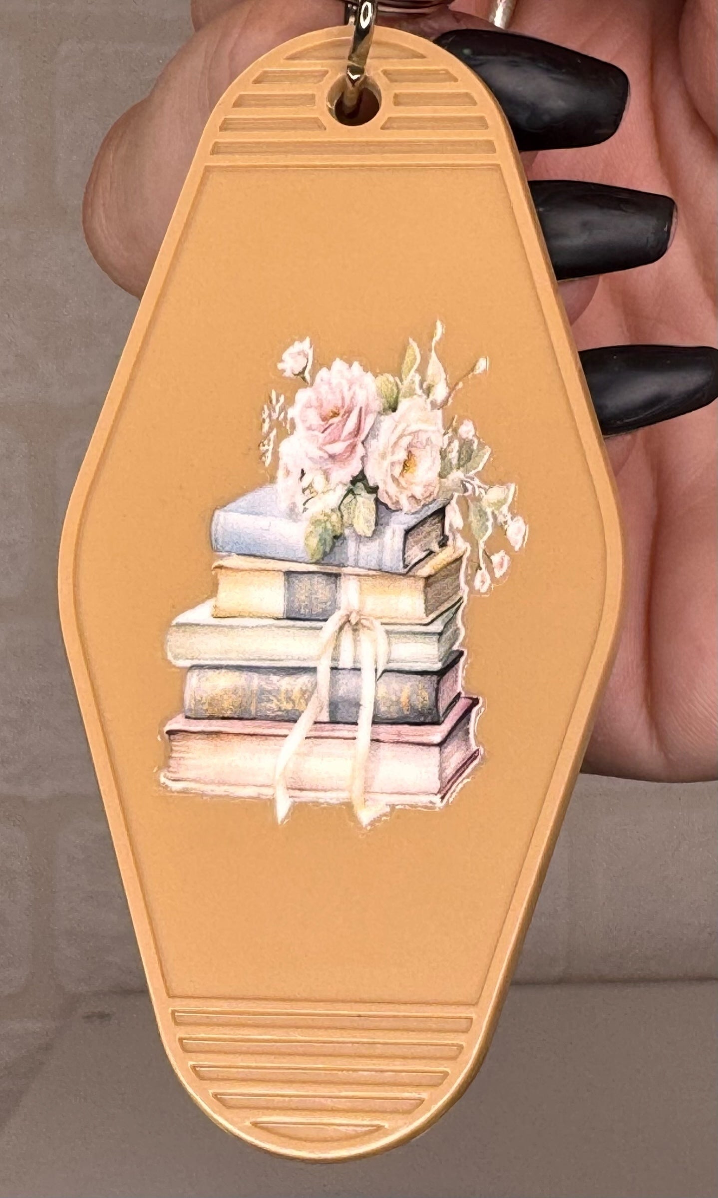 book themed motel keyring