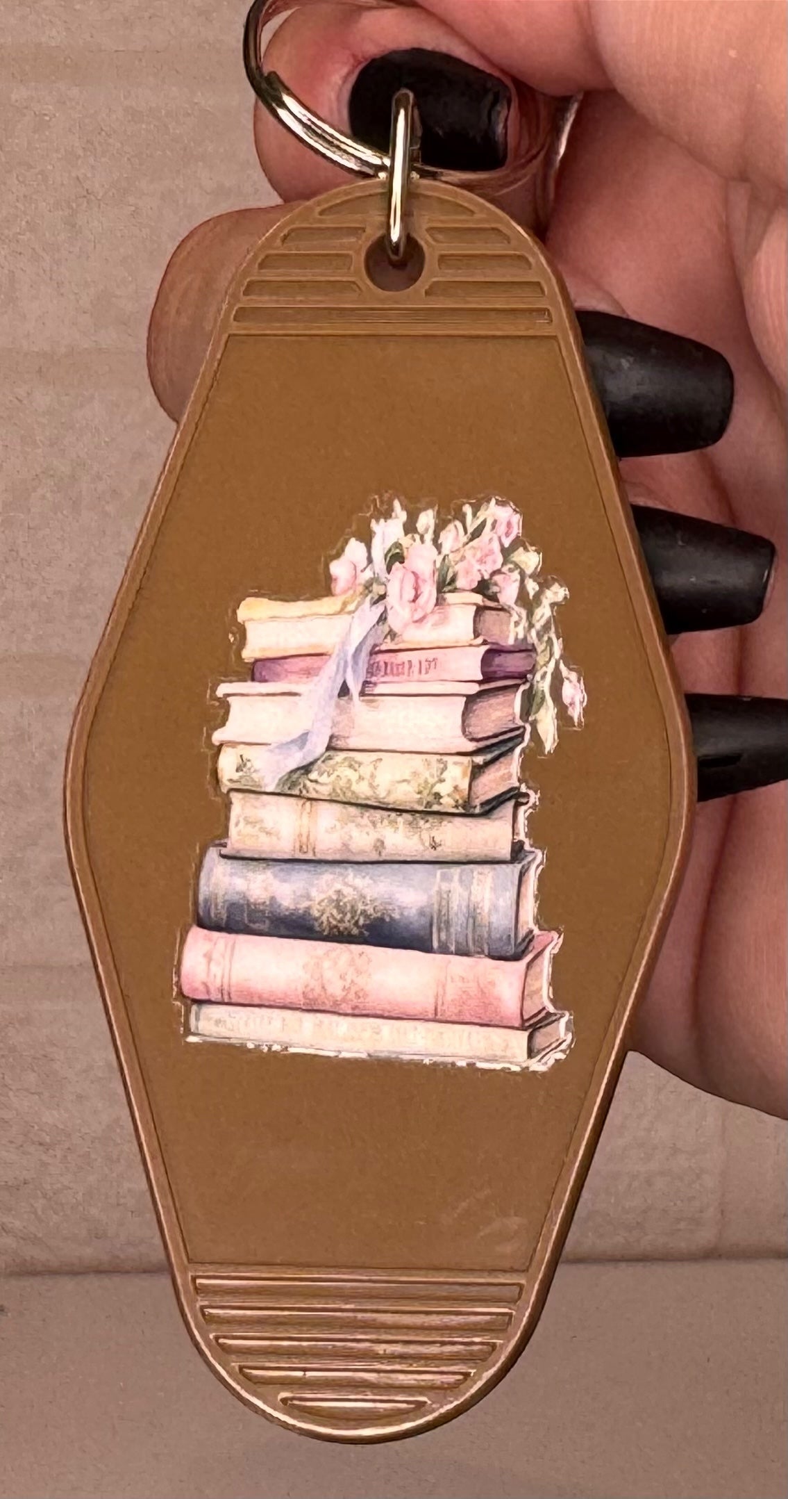 book themed motel keyring