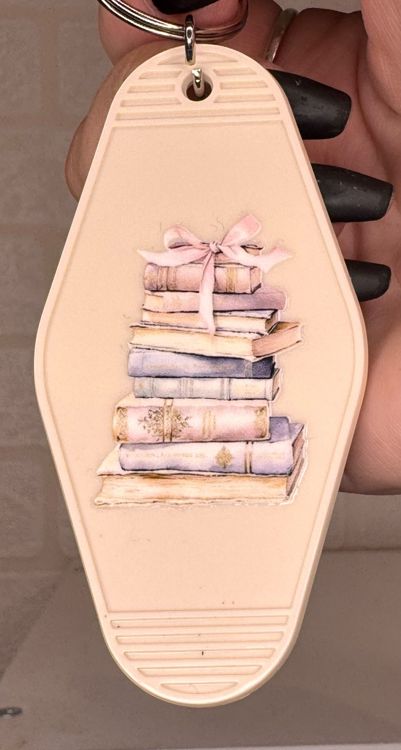 book themed motel keyring