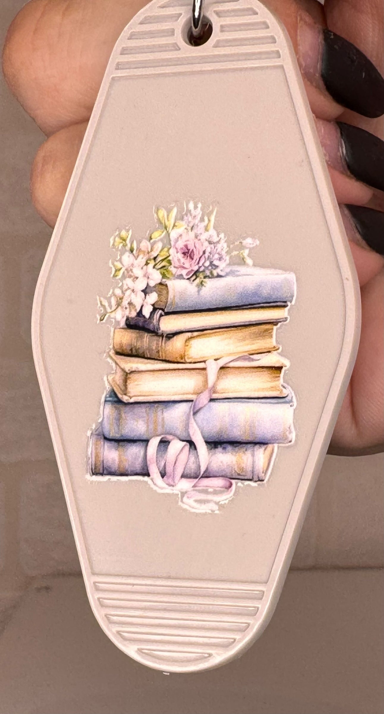 book themed motel keyring