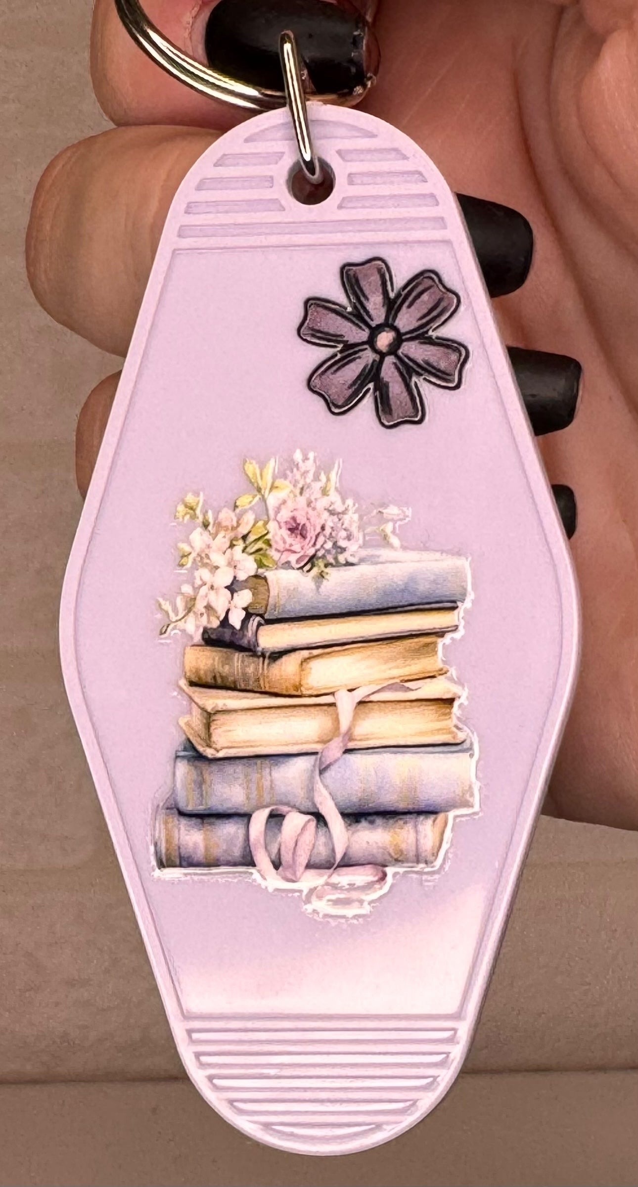 book themed motel keyring