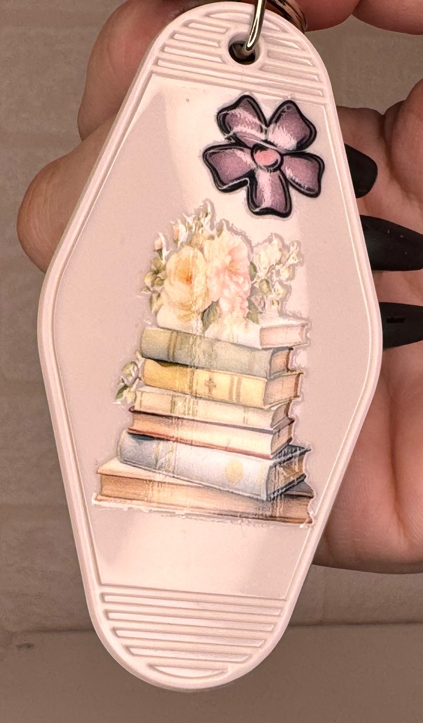 book themed motel keyring