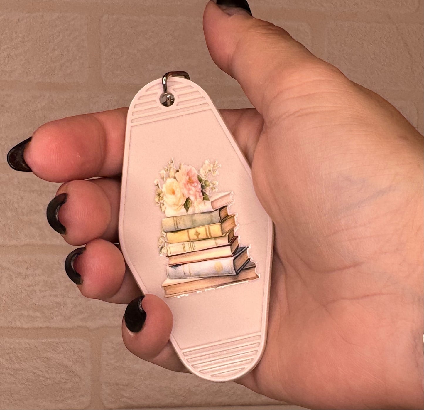 book themed motel keyring