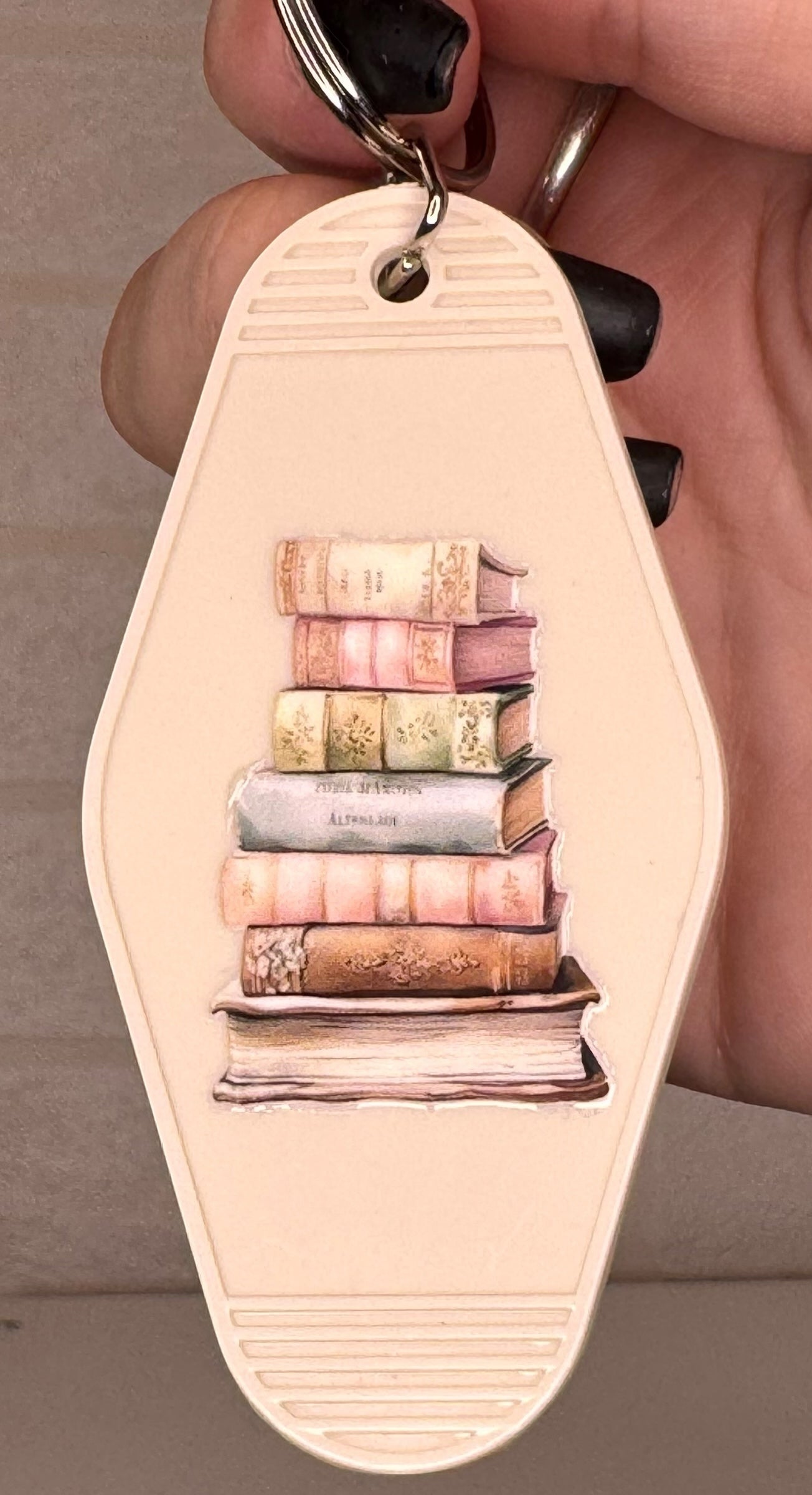 book themed motel keyring