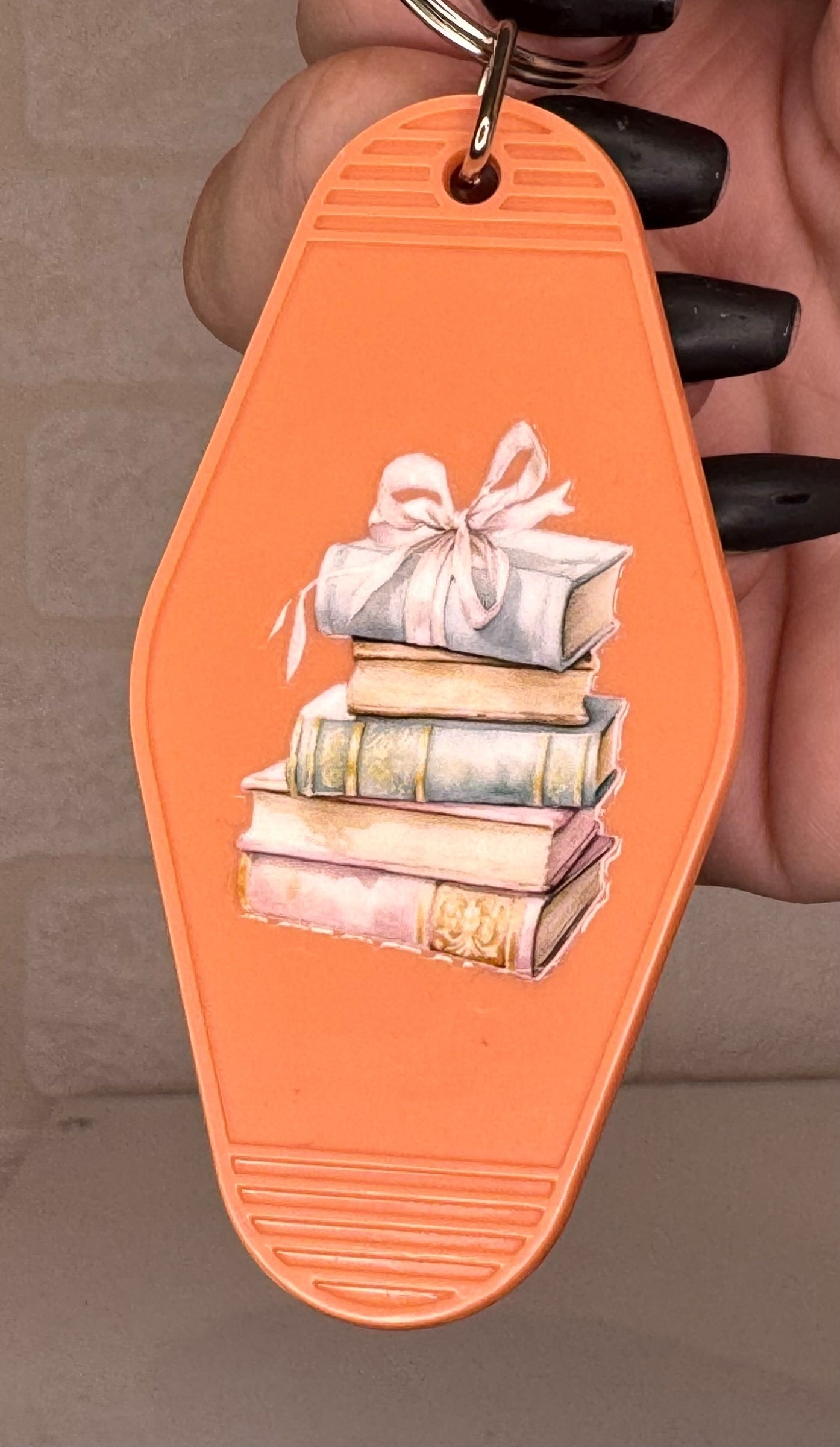 book themed motel keyring