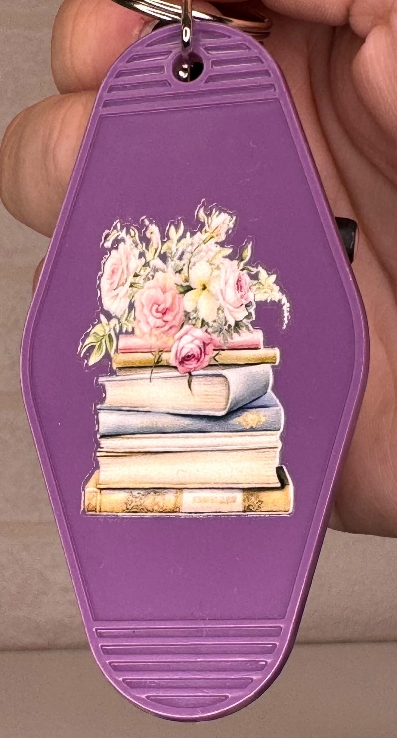 book themed motel keyring