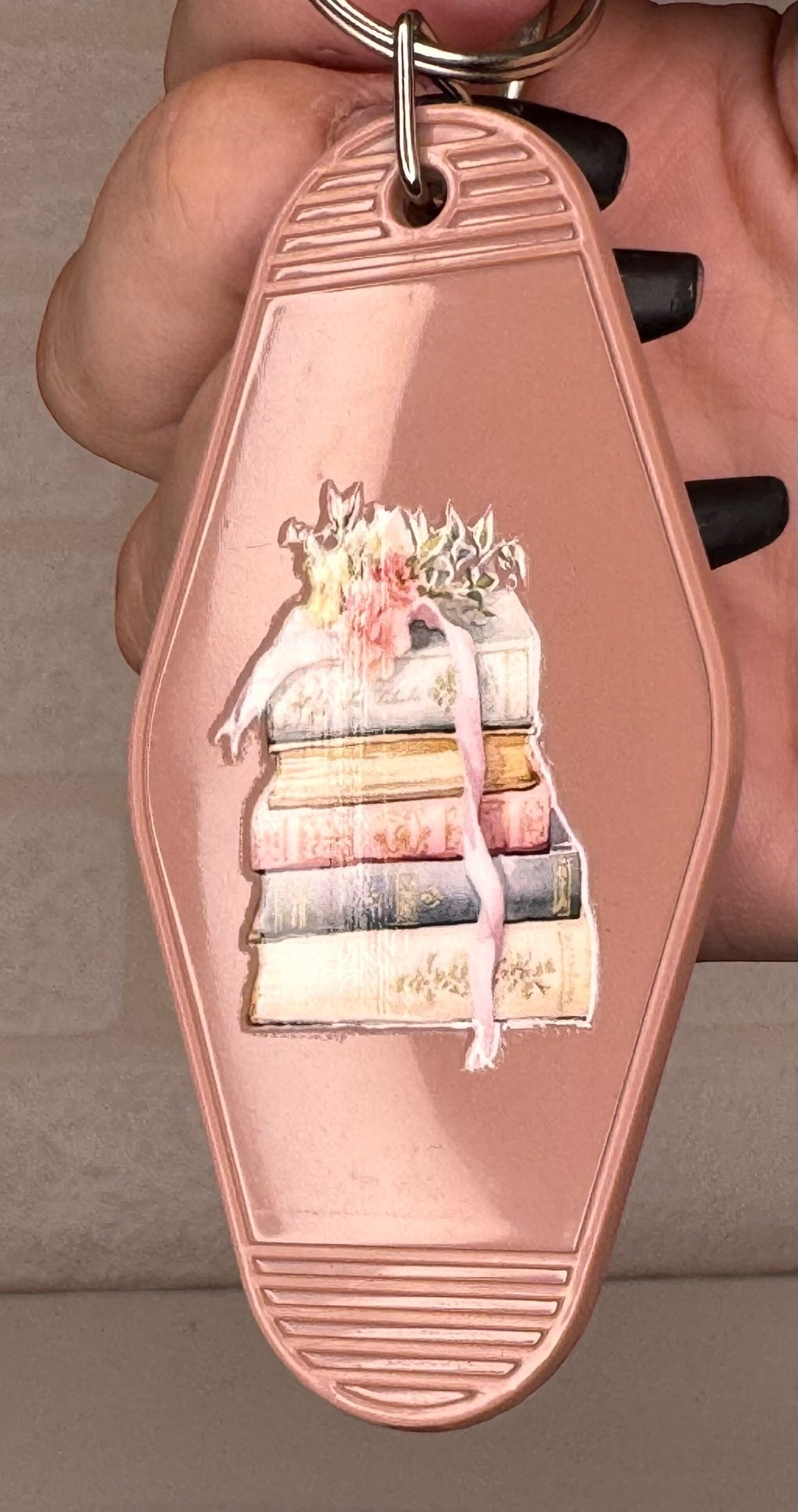 book themed motel keyring