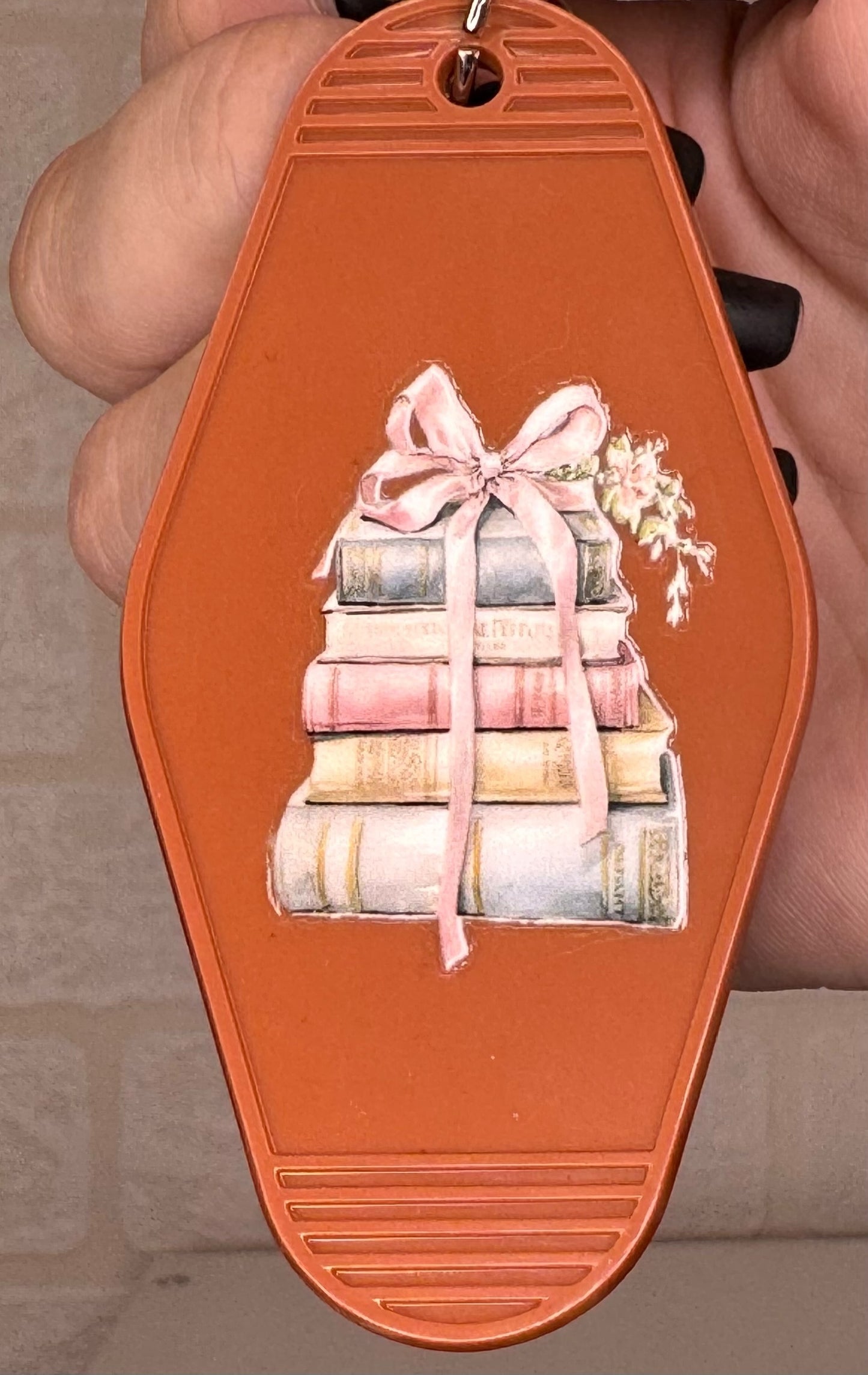 book themed motel keyring