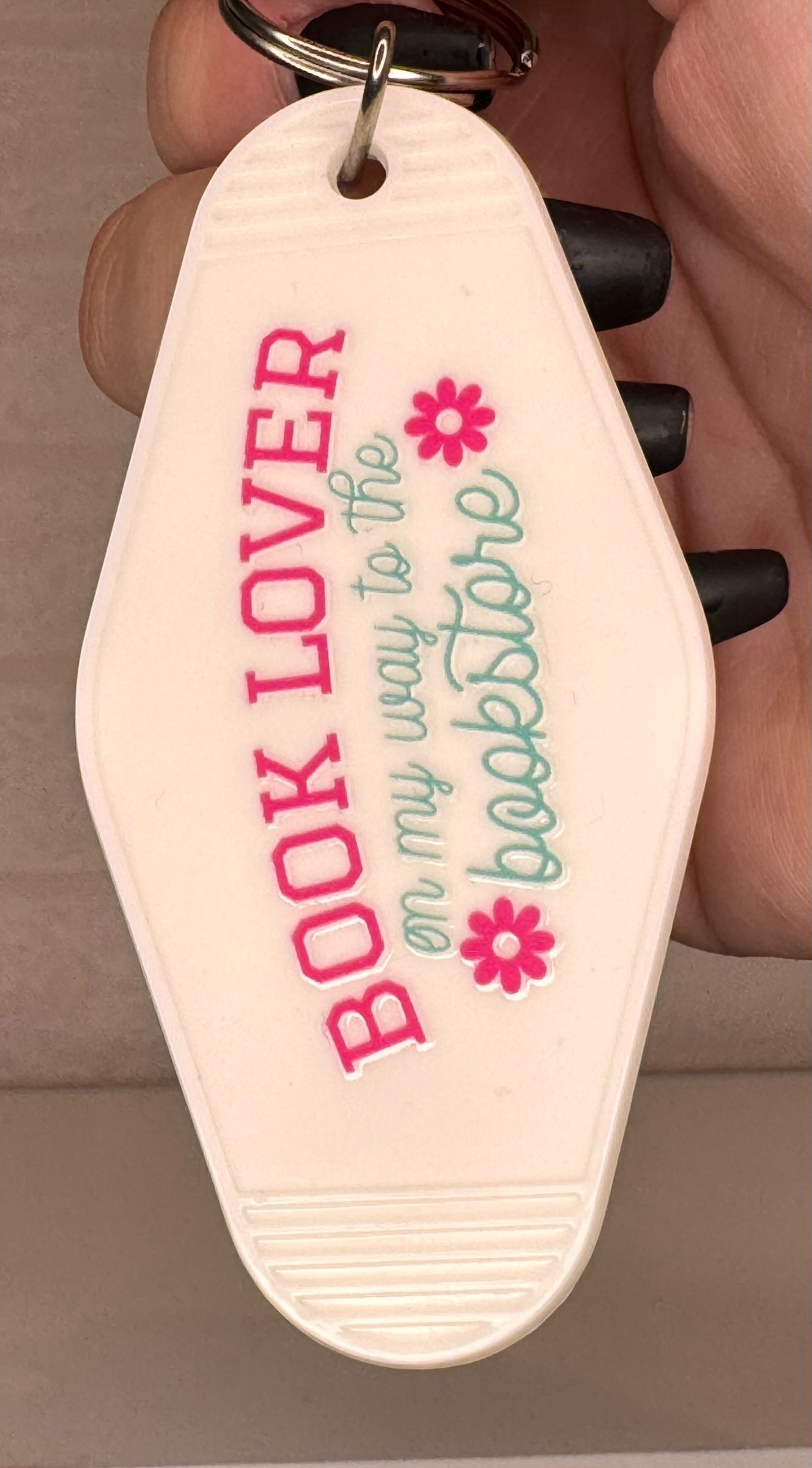 book themed motel keyring